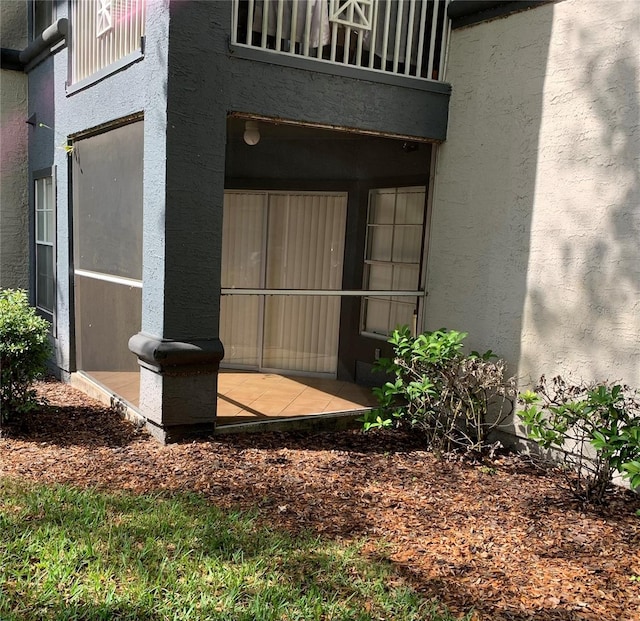 property entrance with a balcony