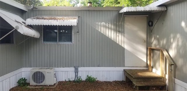 view of property exterior with ac unit