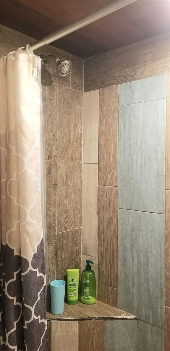 bathroom featuring walk in shower