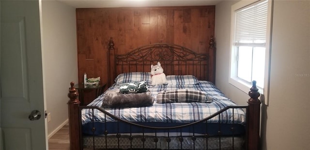 bedroom featuring hardwood / wood-style flooring