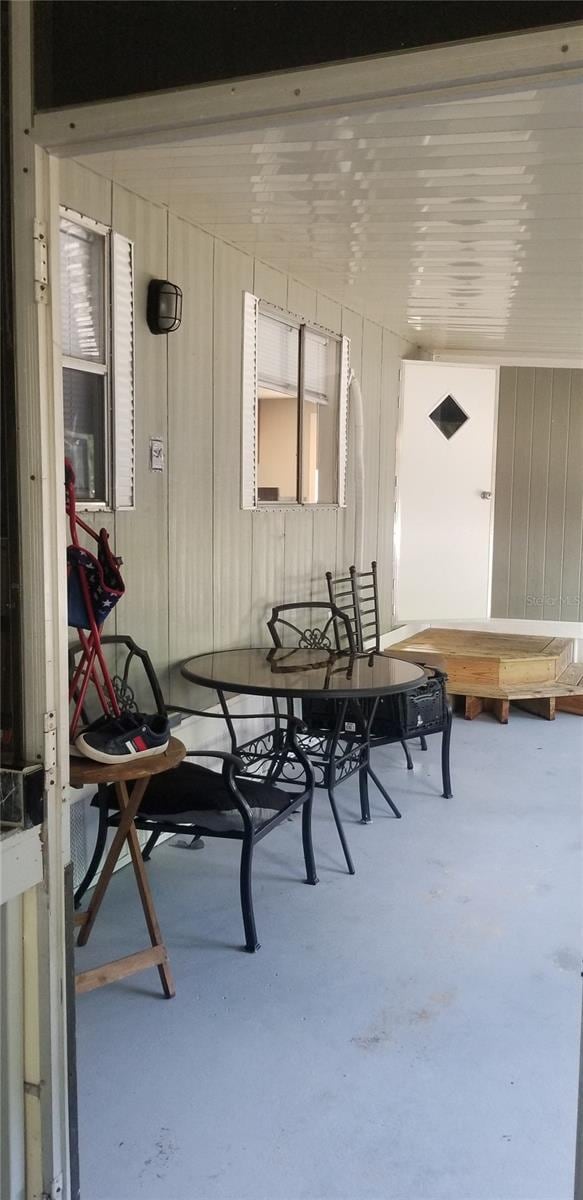 dining area featuring concrete floors