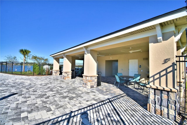 view of patio with ceiling fan