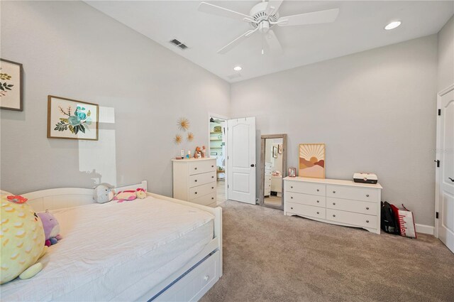 bedroom with ceiling fan and light colored carpet