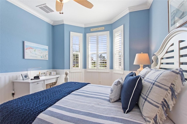 bedroom featuring crown molding and ceiling fan