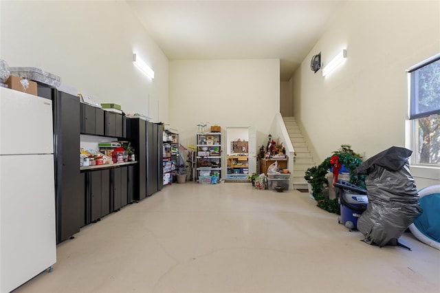 garage with white refrigerator