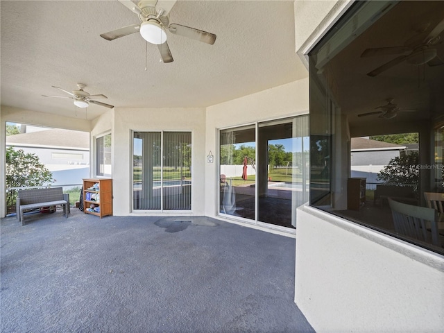 view of patio with ceiling fan