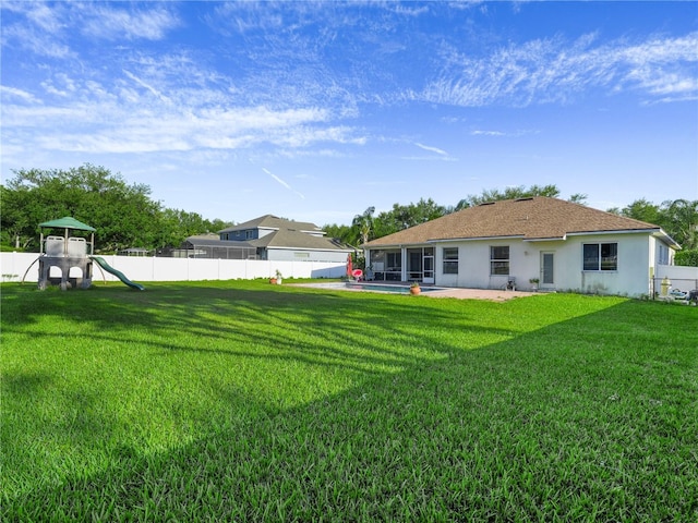 view of yard with a playground