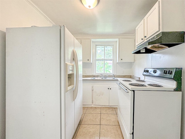 kitchen with sink, light tile patterned floors, white appliances, and white cabinets