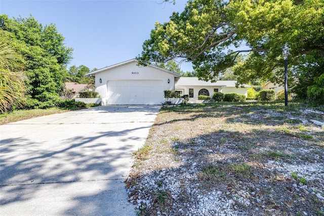 single story home with a garage