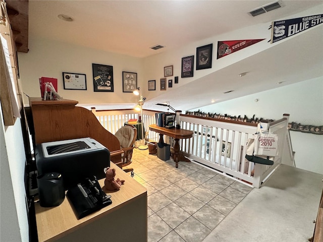 interior space featuring light tile floors