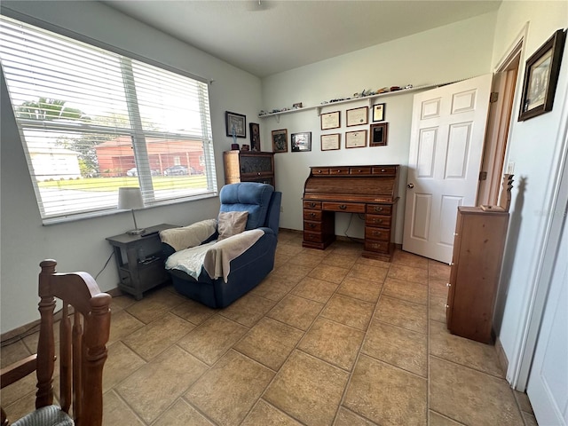 sitting room with light tile flooring