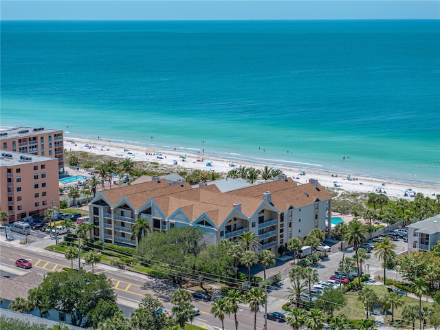 aerial view featuring a water view and a beach view