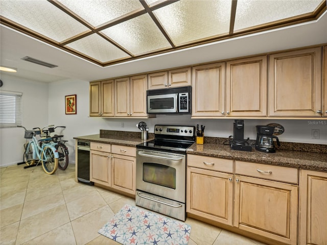 kitchen with light brown cabinetry, stainless steel appliances, light tile floors, and beverage cooler