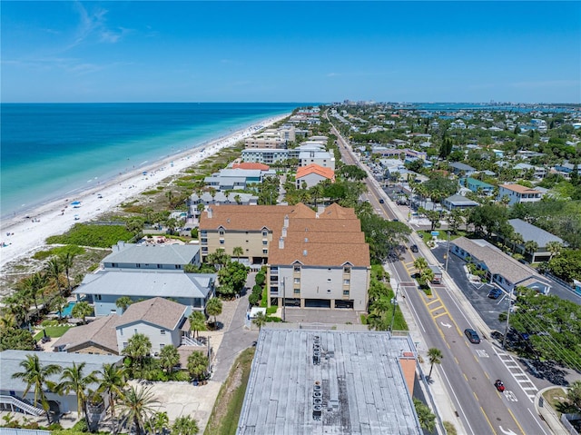 bird's eye view featuring a water view and a view of the beach