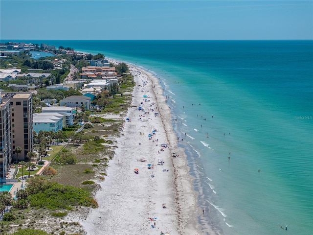 drone / aerial view with a view of the beach and a water view