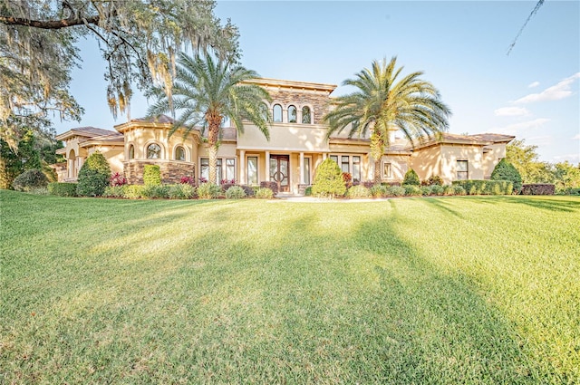 view of front of property with a front lawn