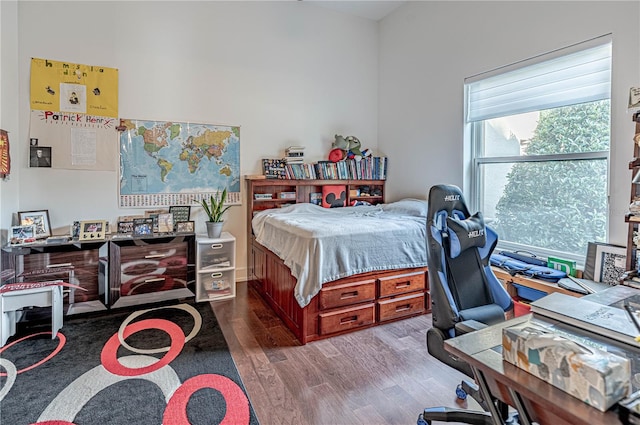 bedroom featuring dark hardwood / wood-style floors