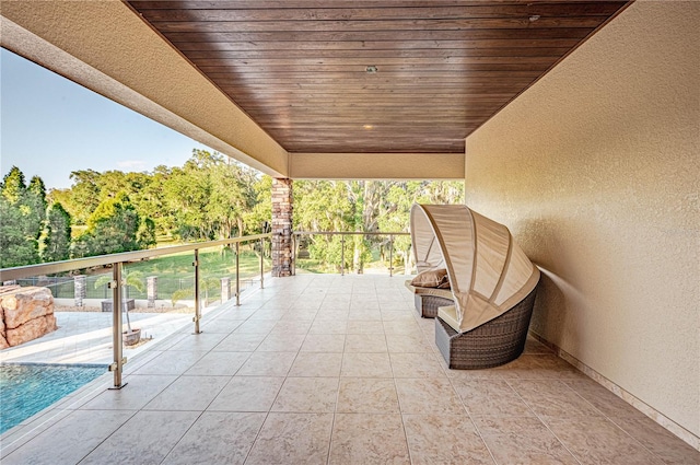 view of patio / terrace with a balcony