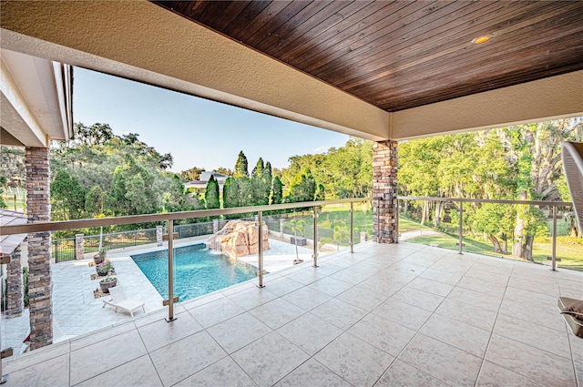 view of swimming pool featuring pool water feature