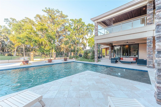 view of swimming pool with a patio area