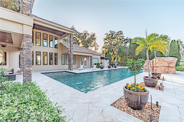 view of pool featuring a patio area