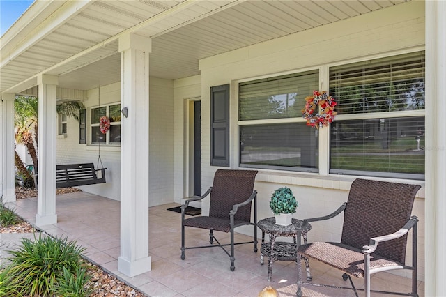 view of terrace with a porch