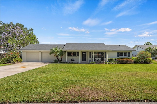 single story home featuring a front yard and a garage