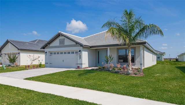 ranch-style house with a garage and a front yard