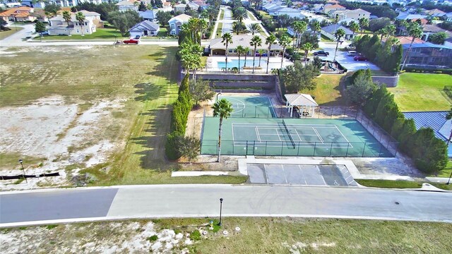 birds eye view of property with a residential view