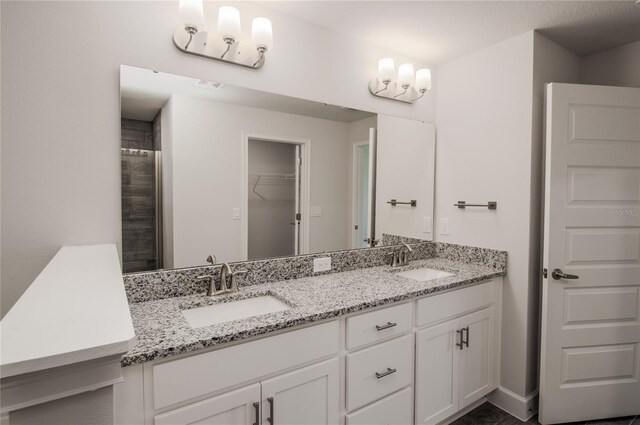 bathroom featuring dual vanity