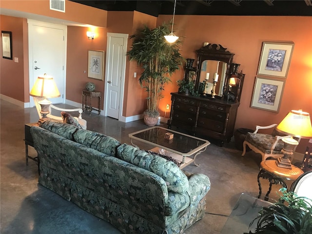 living room with concrete floors