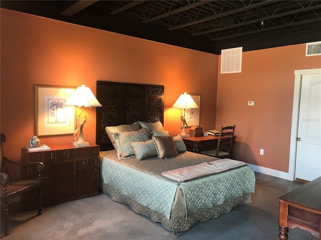 bedroom with concrete flooring