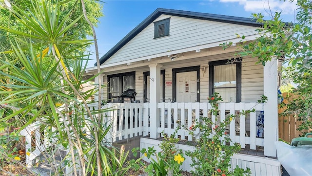 bungalow-style house featuring covered porch