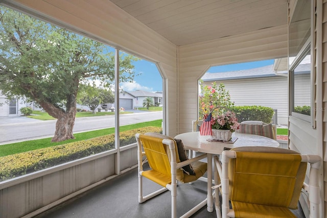 sunroom featuring a healthy amount of sunlight