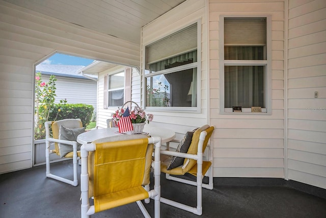 view of patio featuring a porch