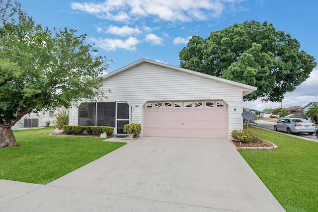 single story home with central AC, a garage, and a front lawn