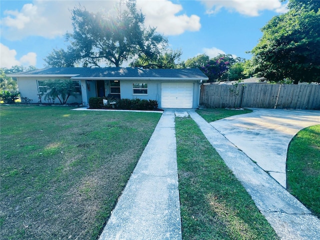 ranch-style house with a front lawn and a garage