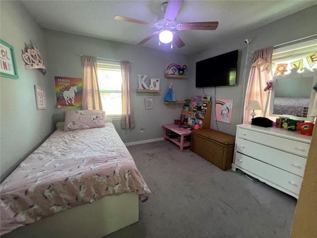 carpeted bedroom featuring ceiling fan