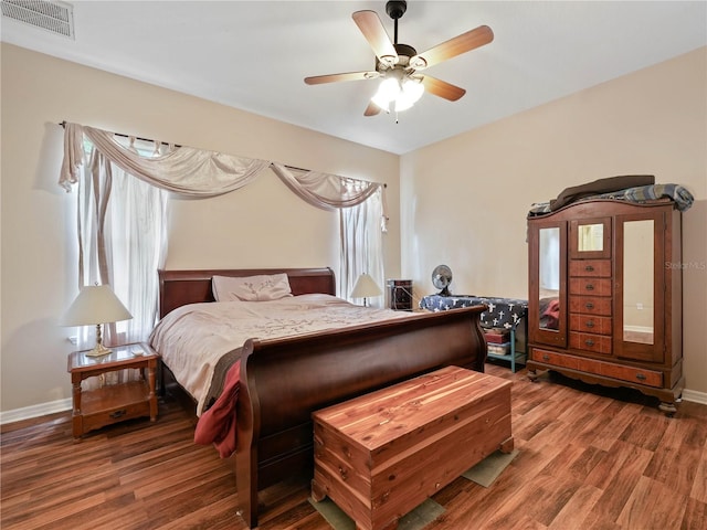 bedroom featuring ceiling fan and hardwood / wood-style floors