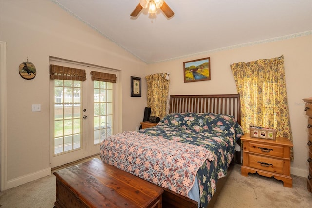 carpeted bedroom featuring access to outside, multiple windows, vaulted ceiling, and ceiling fan