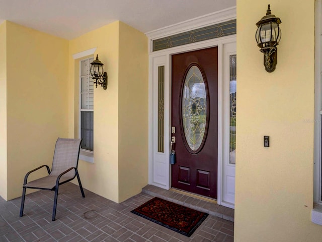 entrance to property with a porch