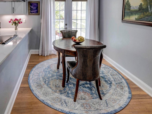 dining space featuring light hardwood / wood-style floors