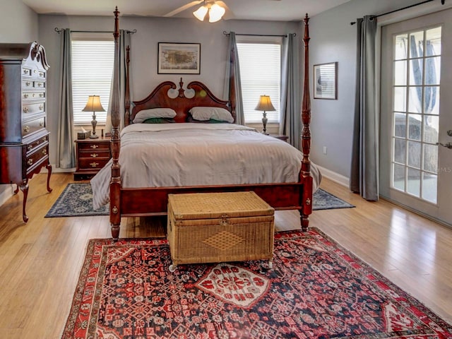 bedroom featuring light hardwood / wood-style floors and ceiling fan