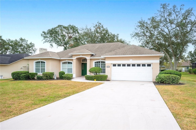 ranch-style house with a front lawn and a garage