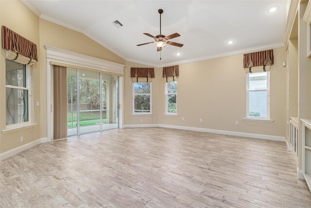 unfurnished room featuring ceiling fan, ornamental molding, vaulted ceiling, and light wood-type flooring