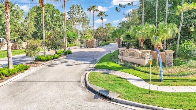 view of home's community featuring a yard