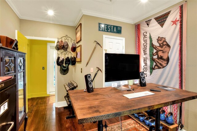 home office featuring dark hardwood / wood-style flooring and crown molding