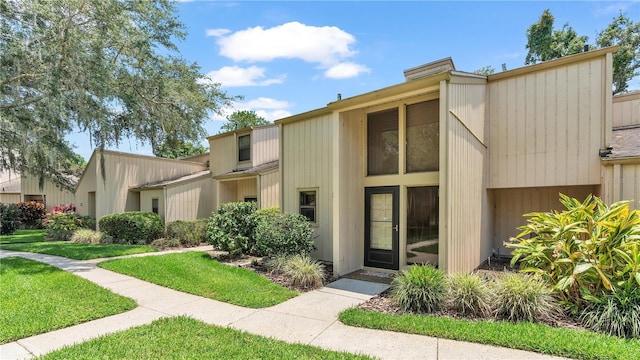 view of front of property with a front lawn