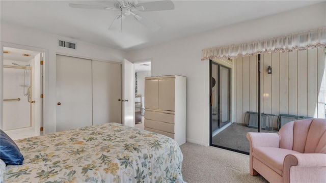 carpeted bedroom with ceiling fan and a closet