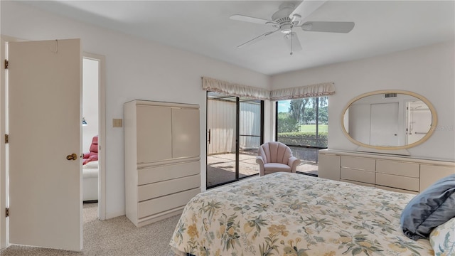 carpeted bedroom with access to exterior and ceiling fan